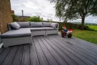 HD Deck 3D+ in shade black oak garden patio with seating- Composite Prime